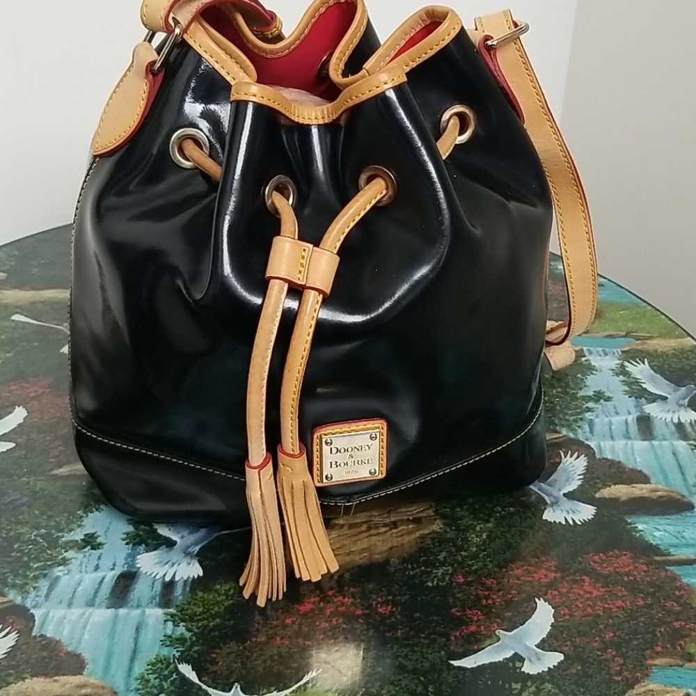 Dooney and Bourke Patent drawstring bag